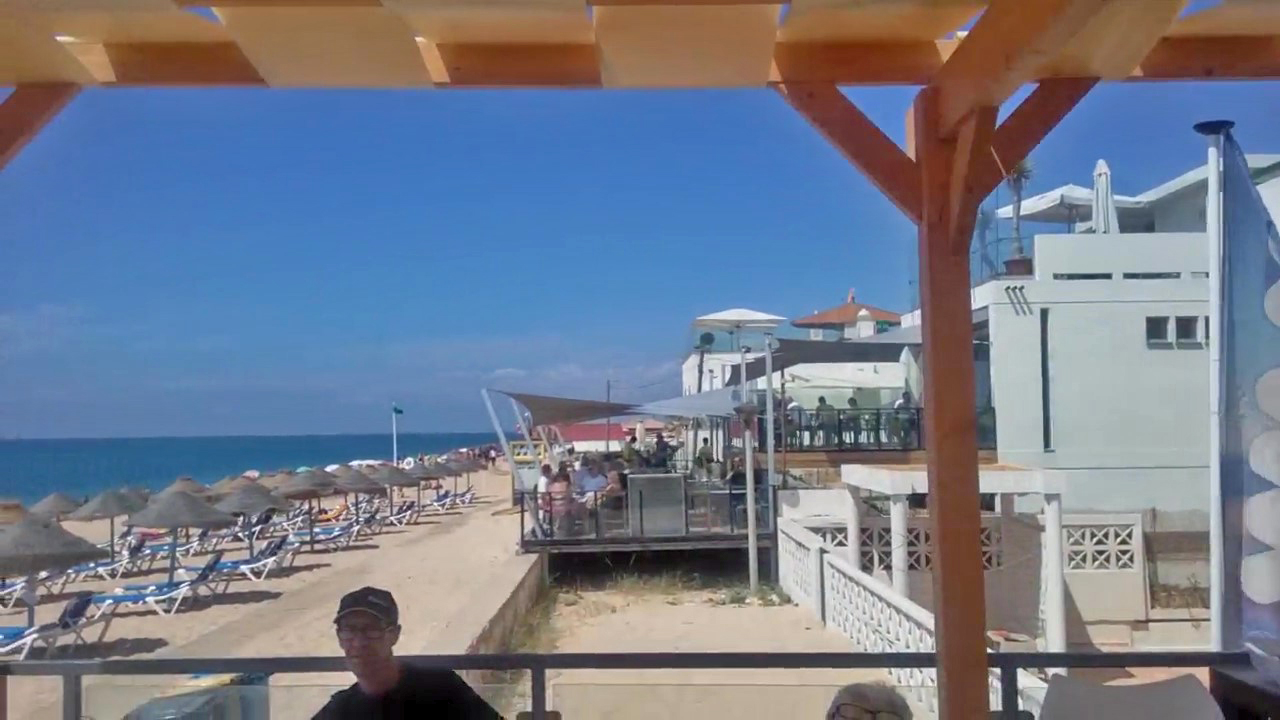 A view along Faro beach from Wax RestoBar
