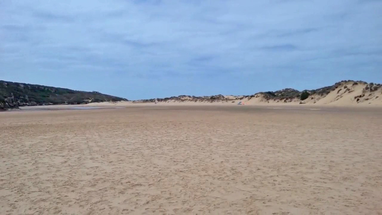 sand flats, dunes and river at Praia da Amoreira, Aljezur, Algarve, Portugal